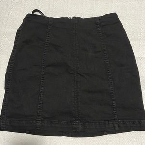 Black miniskirt, form fitting, super cute!